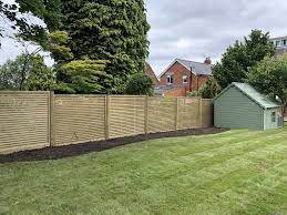 How Can a Garden Fence Define and Organize Your Outdoor Space in Cheltenham?